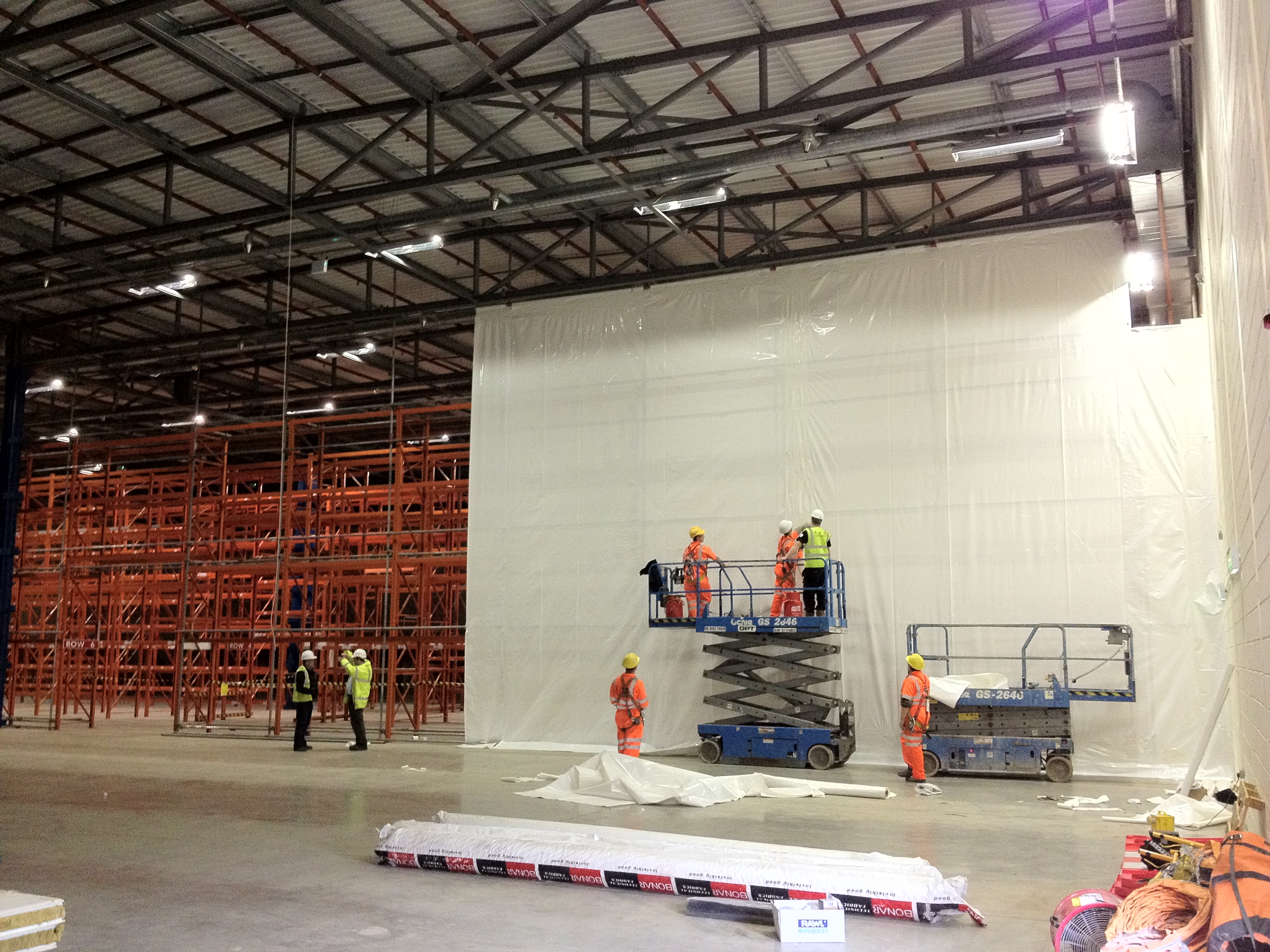 Shrink wrap warehouse partition training Tufcoat