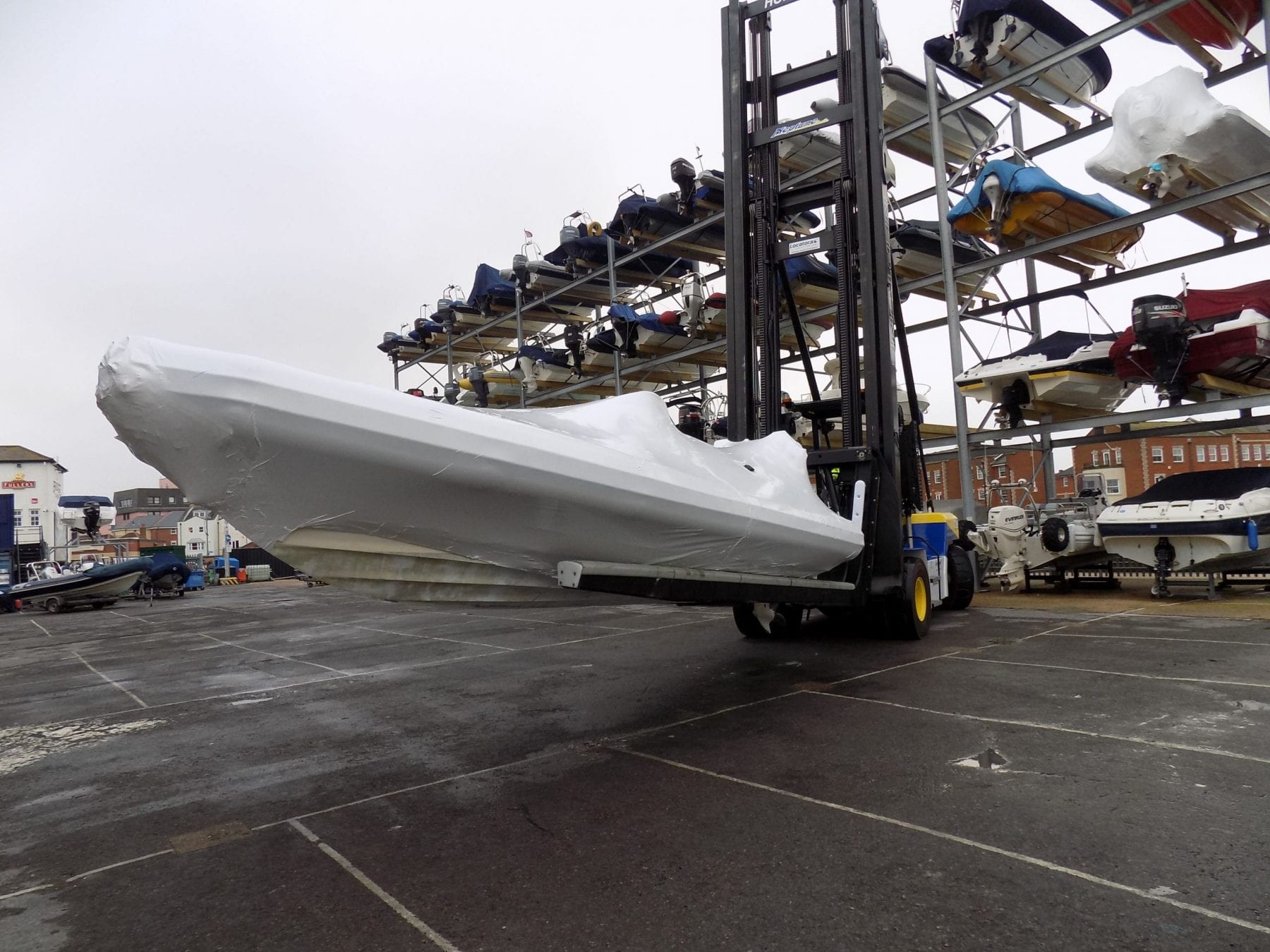 Shrink-wrapped RIB being stored in dry stacks Shrink-wrapped RIB being stored in dry stacks