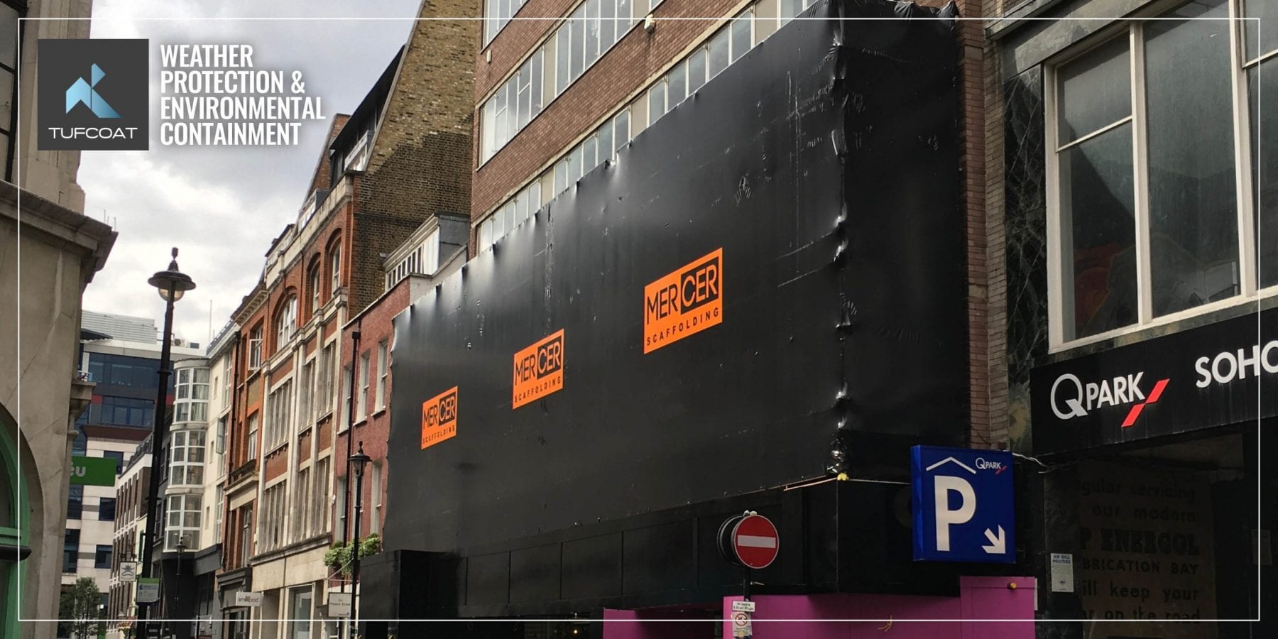 Black Shrink-wrap branded with vinyl stickers in Soho Black scaffold shrink-wrap and vinyl stickers