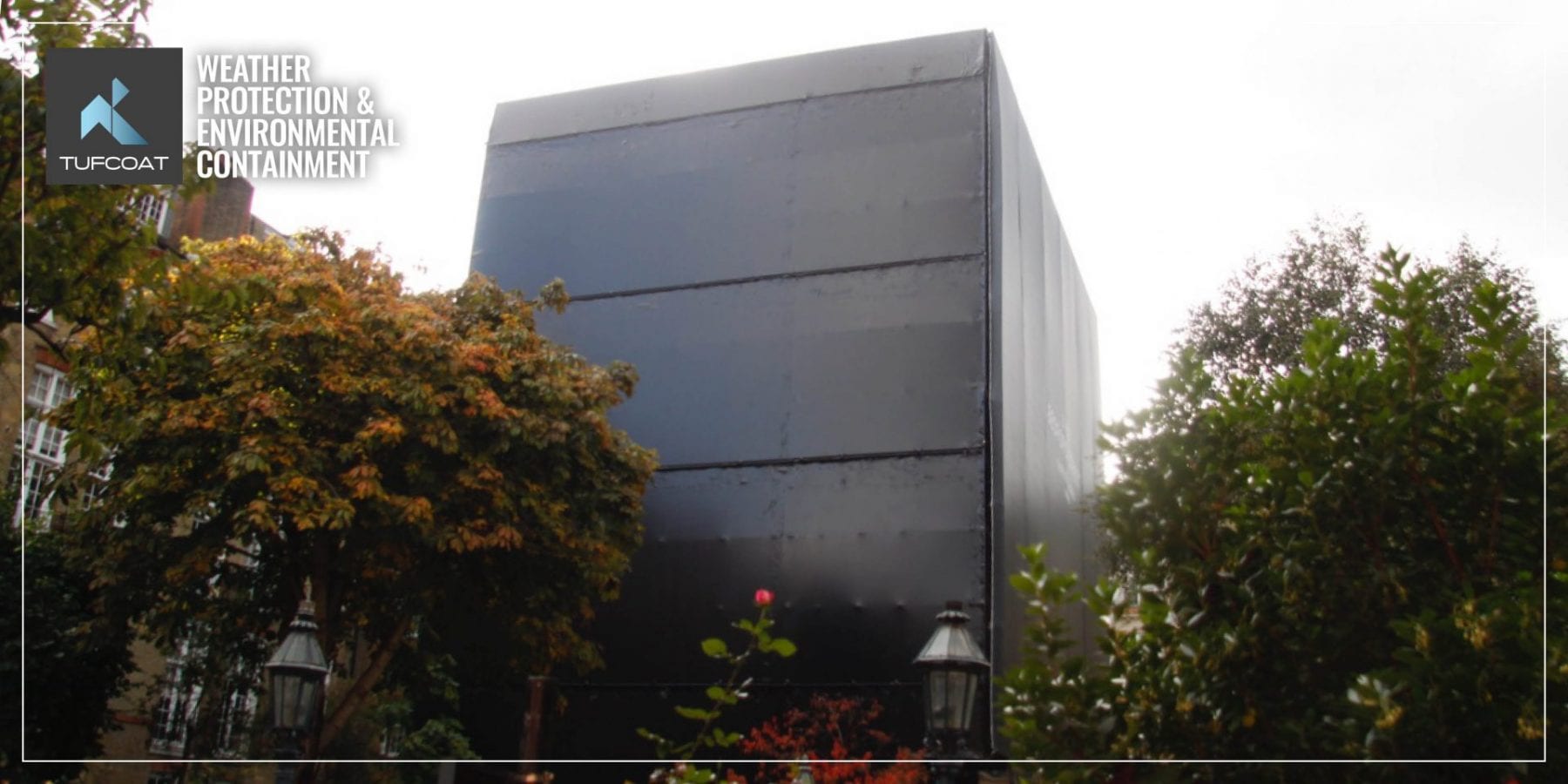 Black Shrink-wrap on a scaffold to compliment a black PVC Building wrap Black scaffold shrink-wrap