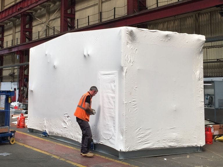 Modular Building Covers using Shrink-wrapped for transport protection